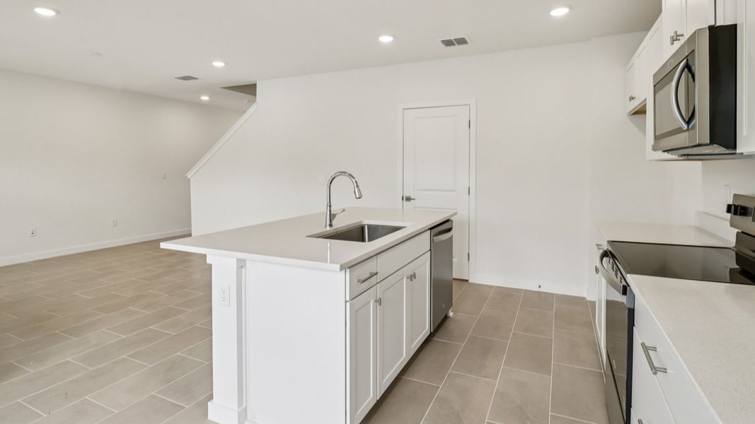 Representative furnished interior of a home built from the Carmel - Interior by DRB Homes in Cyrene at Harmony, St. Cloud (Image 9). Representative furnished interior of a home built from the Carmel - Interior by DRB Homes in Cyrene at Harmony, St. Cloud (Image 9).