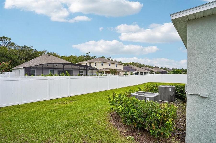 Exterior details and patio area of a home in Elegant Manor Estates, Edgewater (Image 32). Exterior details and patio area of a home in Elegant Manor Estates, Edgewater (Image 32).