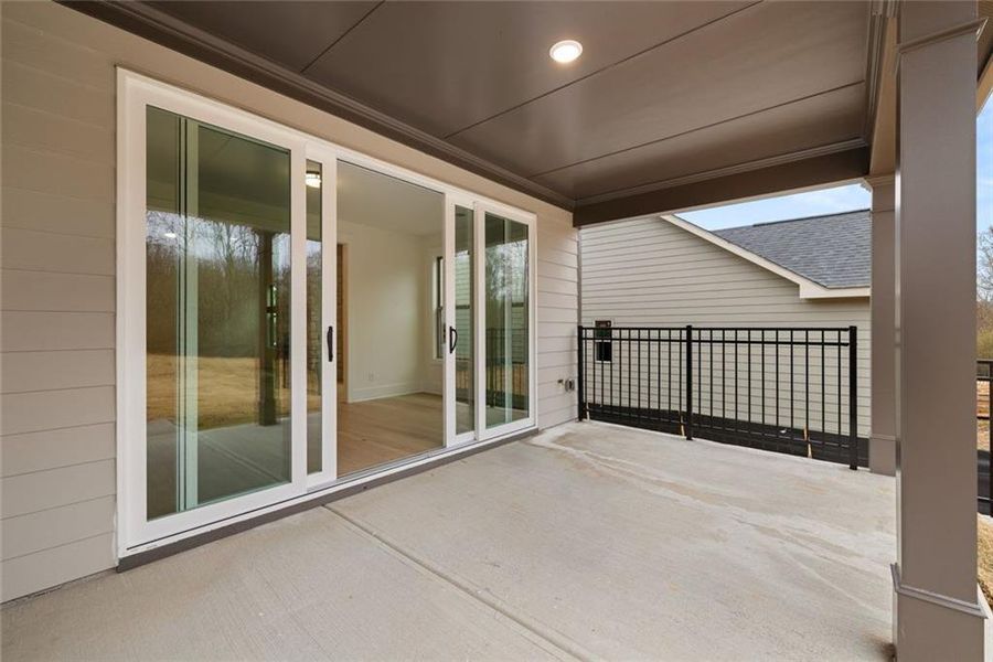 Exterior details and patio area of a home in Soleil Belmont Park, Canton (Image 29).