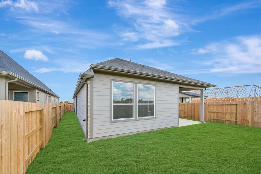 Exterior details and patio area of a home in The Grand Prairie - Meadow Collection, Hockley (Image 3).