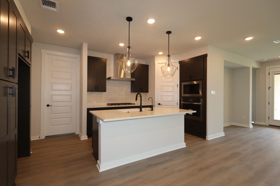 Furnished interior view inside a new home in Flora, Hutto (Image 5).