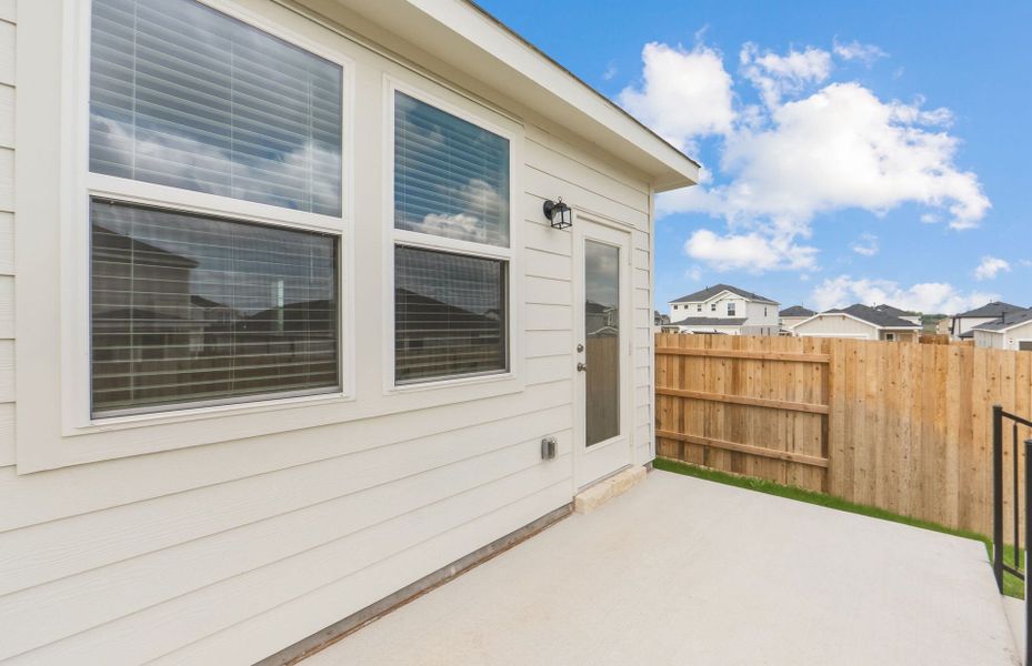 Exterior details and patio area of a home in Sunfield, Buda (Image 4). Exterior details and patio area of a home in Sunfield, Buda (Image 4).