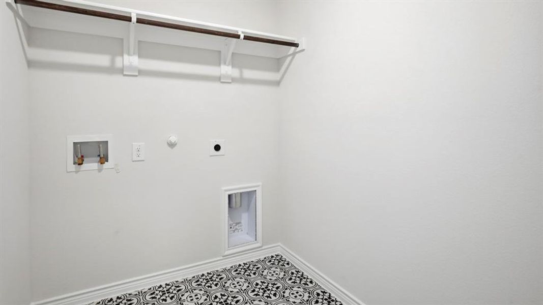 Washroom featuring gas dryer hookup, hookup for a washing machine, and electric dryer hookup