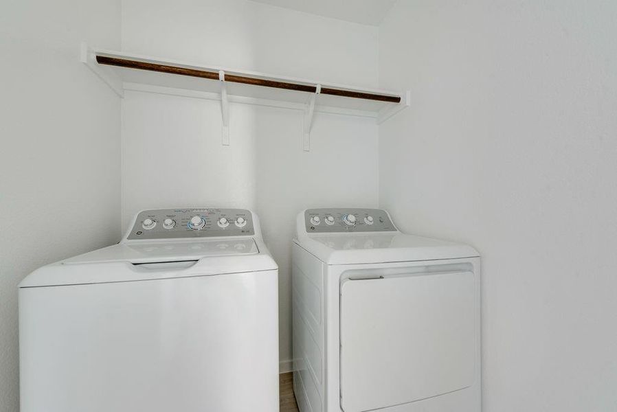 Laundry room with washer and dryer
