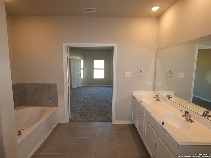 Furnished interior view inside a new home in Agave, San Antonio (Image 8).