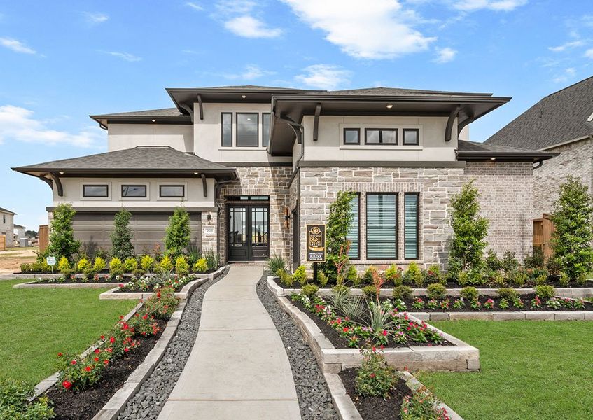 Front exterior of a new home in Legacy Prairie at Katy Court 60', Katy, TX, highlighting curb appeal (Image 20).