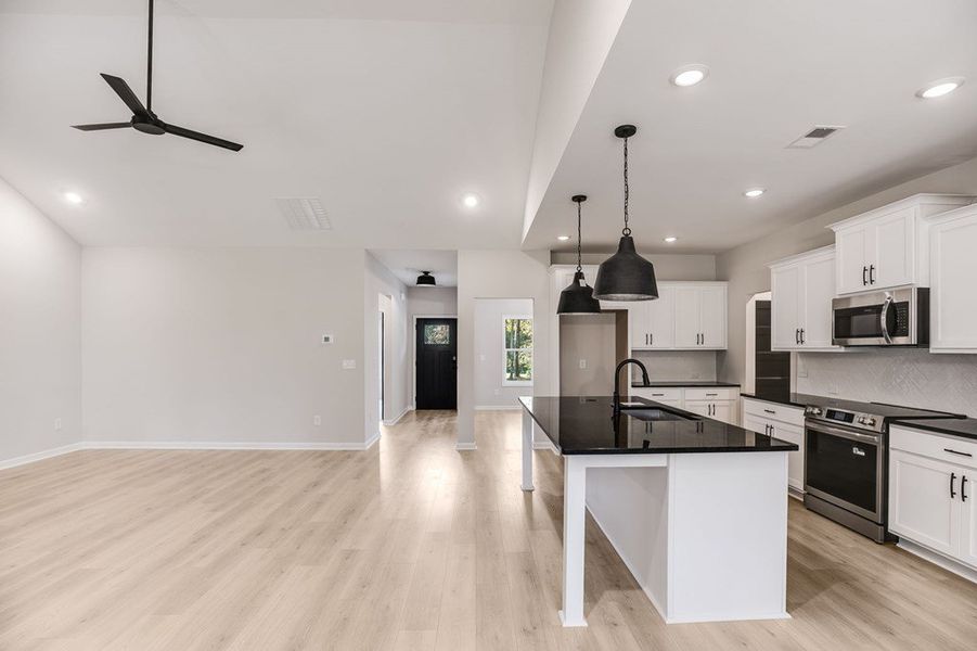 Furnished interior view inside a new home in LOVVORN ESTATES, Carrollton (Image 14).