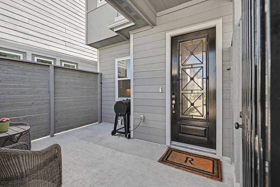 The welcoming entry features a front door with decorative glass. The welcoming entry features a front door with decorative glass.