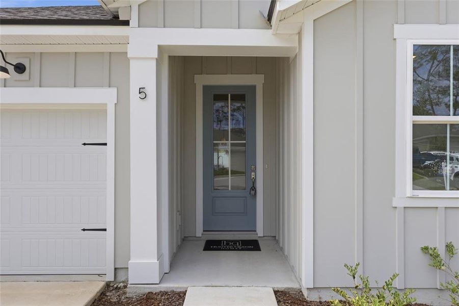 Exterior details and patio area of a home in Palm Coast Homes, Palm Coast (Image 31).