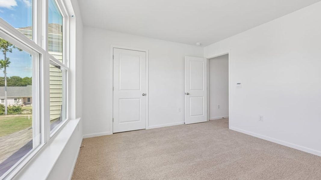 Spacious, unfurnished interior of a new home in Mason Ridge, Spring Lake (Image 33).