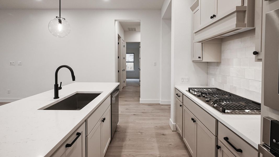 Furnished interior view inside a new home in Crosswinds, Kyle (Image 6).