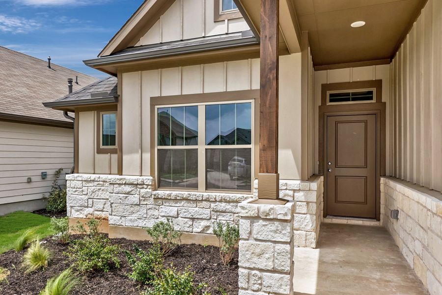 Exterior details and patio area of a home in Prairie Winds, Hutto (Image 3).