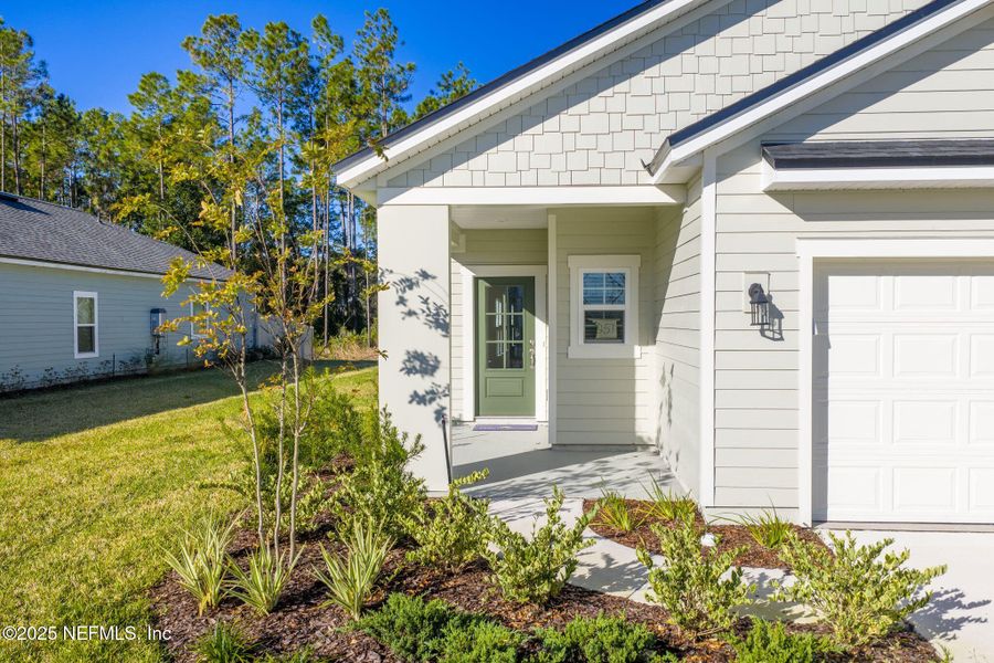 Exterior details and patio area of a home in Beacon Lake, St. Augustine (Image 3).