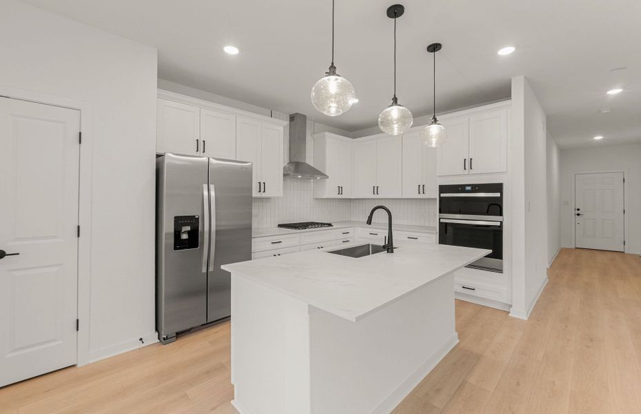 Furnished interior view inside a new home in Sunfield, Buda (Image 9).