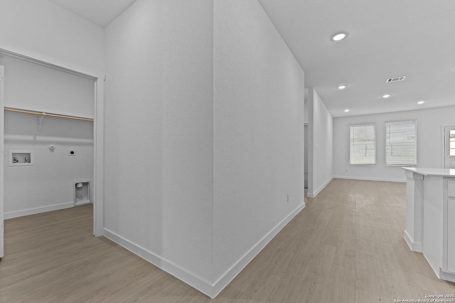 Spacious, unfurnished interior of a new home in Parkside: Coastline Collection, New Braunfels (Image 17).