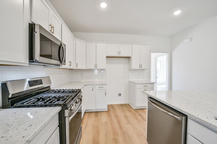 Furnished interior view inside a new home in Mostyn Springs, Magnolia (Image 11).