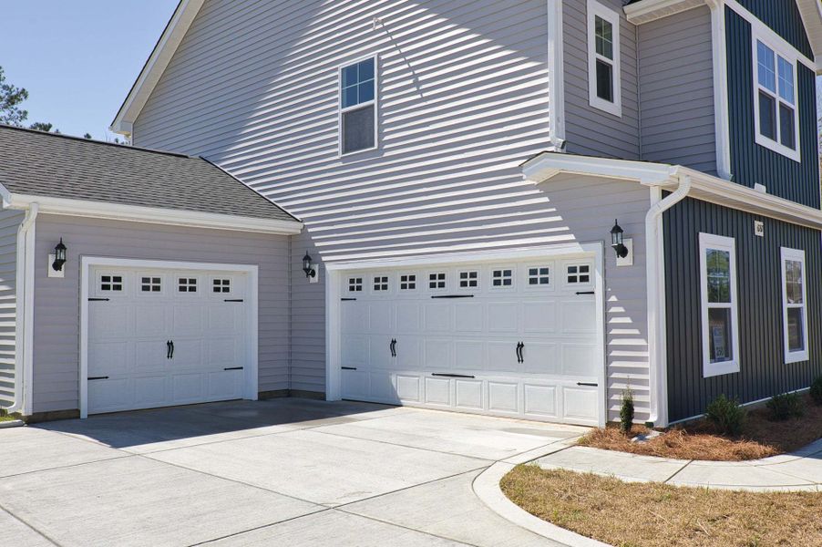 Elevation F with 3-Car Sideload Garage Option Elevation F with 3-Car Sideload Garage Option