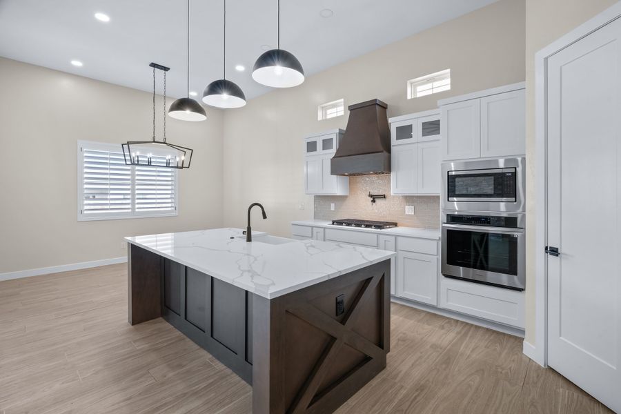 Representative furnished interior of a home built from the Pebble Beach EXT50 by LEH. Homes in Verdancia, El Paso (Image 9).