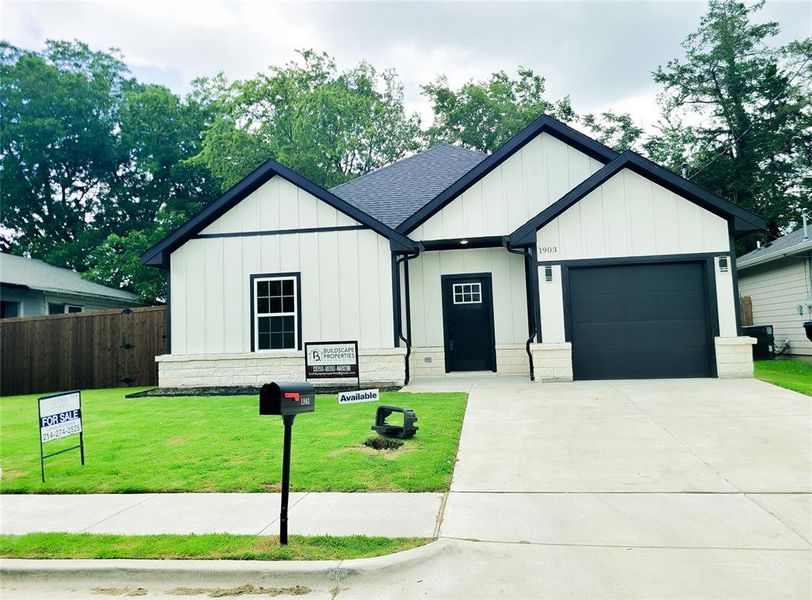 View of front of house featuring an attached garage, concrete driveway, roof with shingles, and board and batten siding View of front of house featuring an attached garage, concrete driveway, roof with shingles, and board and batten siding