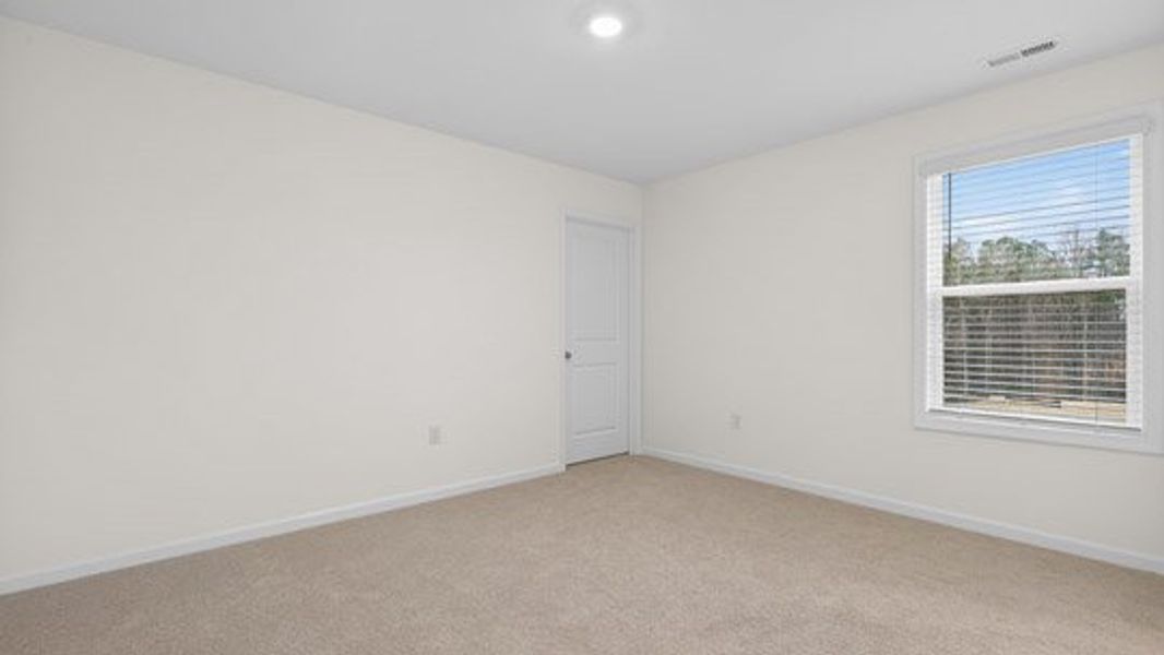 Spacious, unfurnished interior of a new home in The Estates Park, Apex (Image 28).