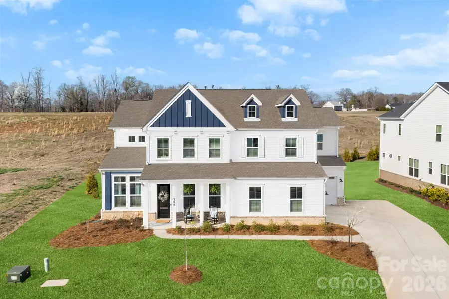 Front exterior of a new home in , Belmont, NC, highlighting curb appeal (Image 20).