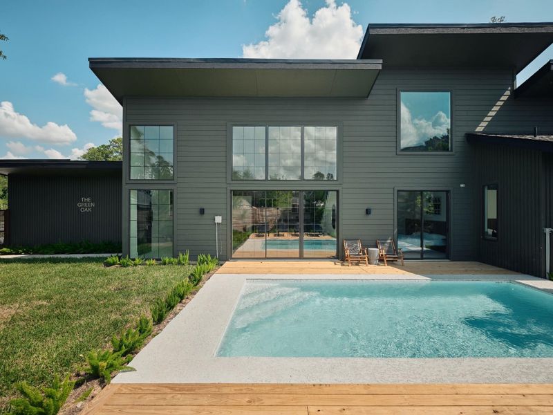 Exterior details and patio area of a home in , Conroe (Image 25).