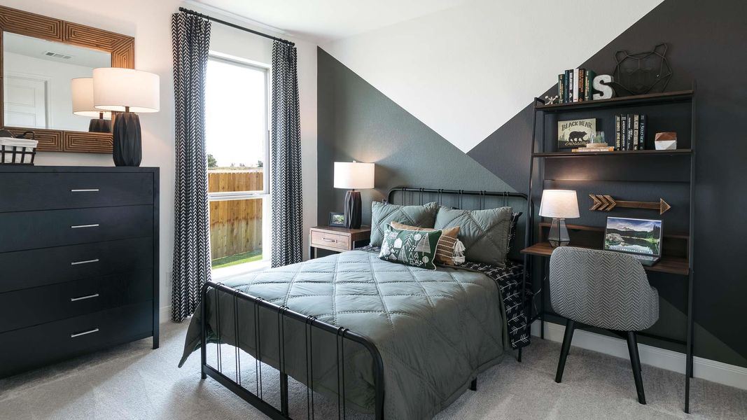 Bedroom with light colored carpet