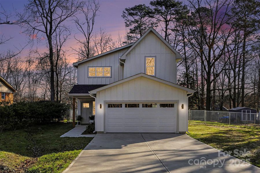 Front exterior of a new home in , Stallings, NC, highlighting curb appeal (Image 1). Front exterior of a new home in , Stallings, NC, highlighting curb appeal (Image 1).