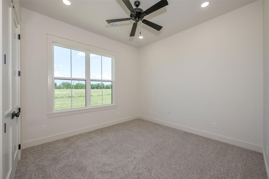 Unfurnished room with carpet, recessed lighting, and a ceiling fan