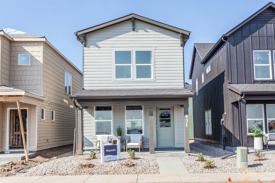 Exterior details and patio area of a home in Prairie Song, Windsor (Image 31).