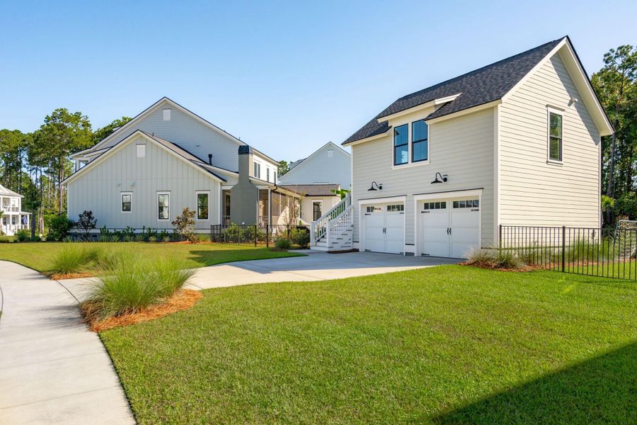 Front exterior of a new home in , Mount Pleasant, SC, highlighting curb appeal (Image 30).