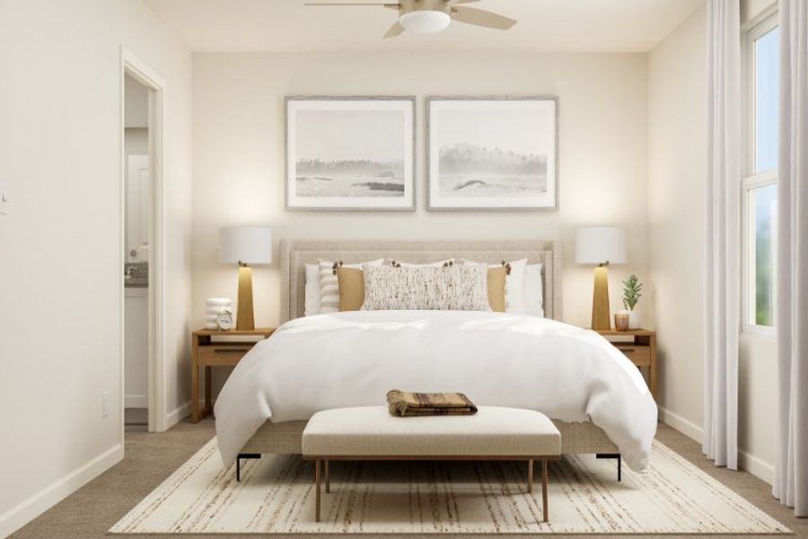 A bedroom with a bed and lamps.