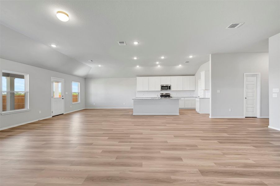 Spacious, unfurnished interior of a new home in Carillon, Manor (Image 15).