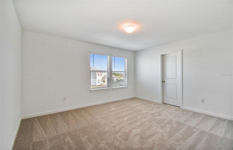 Spacious, unfurnished interior of a new home in Oakfield Lakes, Parrish (Image 11).