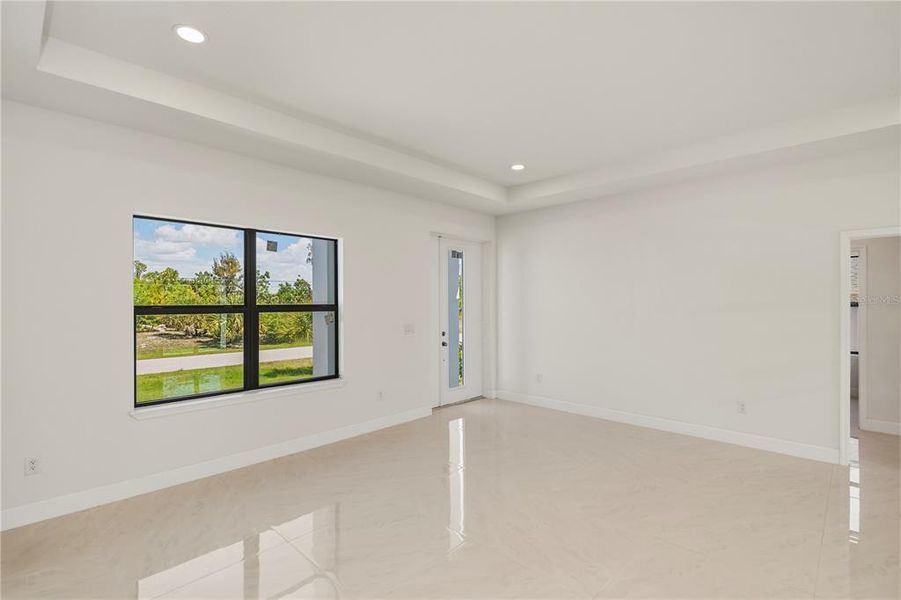 Spacious, unfurnished interior of a new home in , Port Charlotte (Image 41).
