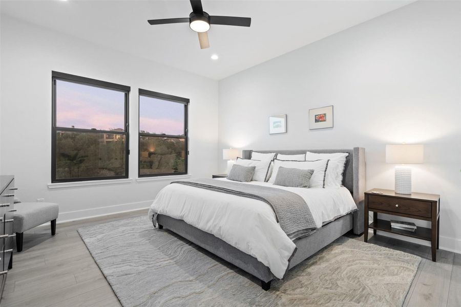 . Three additional ensuite bedrooms provide generous accommodations for family and guests alike.