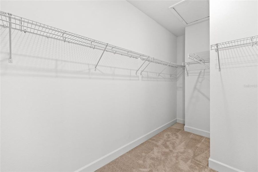Spacious, unfurnished interior of a new home in Harvest At Ovation 50s, Winter Garden (Image 35).