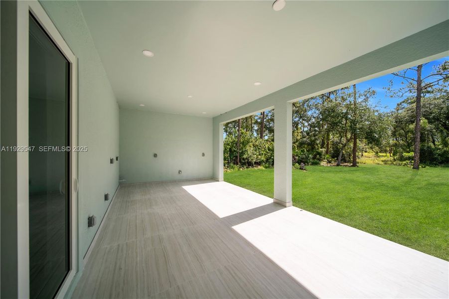 Exterior details and patio area of a home in , Lehigh Acres (Image 25). Exterior details and patio area of a home in , Lehigh Acres (Image 25).