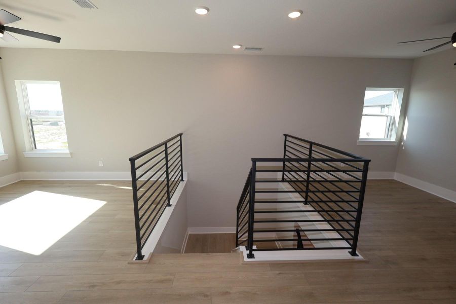 Spacious, unfurnished interior of a new home in Easthaven at Bridgeland Central - Horizon Collection, Cypress (Image 22).