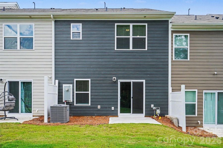 Exterior details and patio area of a home in , Charlotte (Image 3). Exterior details and patio area of a home in , Charlotte (Image 3).