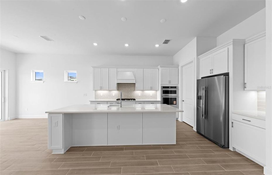 Furnished interior view inside a new home in BeachWalk by Manasota Key, Englewood (Image 17).