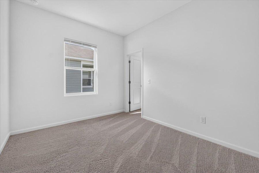 Spacious, unfurnished interior of a new home in Pender Woods at Cane Bay, Summerville (Image 33).
