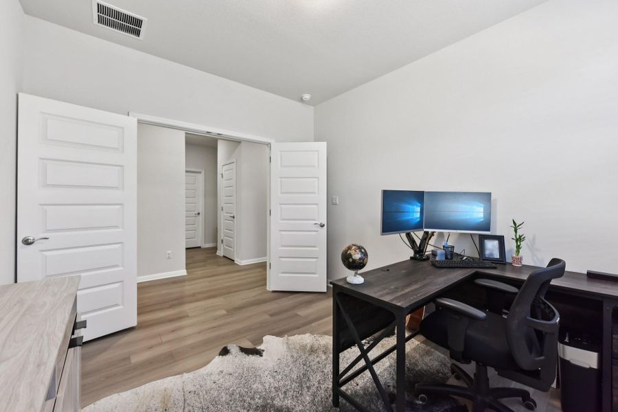 Furnished interior view inside a new home in Big Sky Ranch - Executive Collection, Dripping Springs (Image 9).