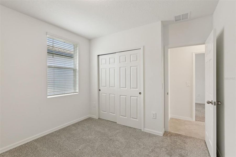 Spacious, unfurnished interior of a new home in Eden Hills, Lake Alfred (Image 13).