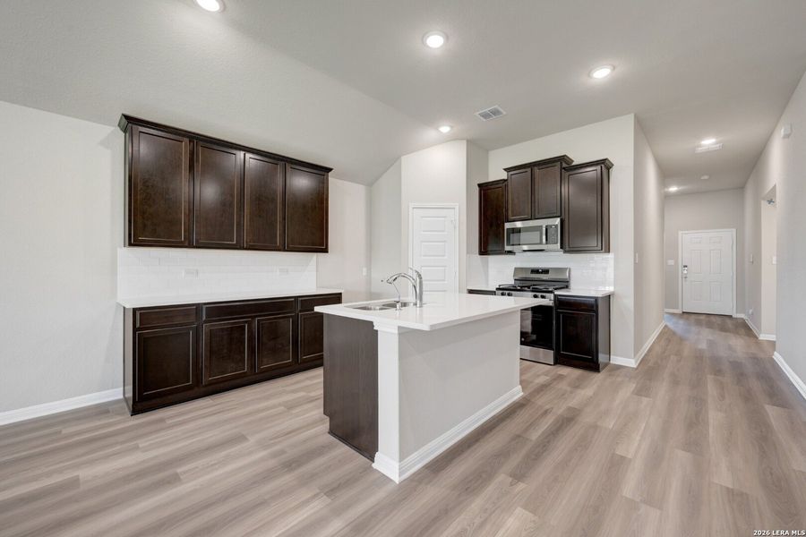 Furnished interior view inside a new home in Mesquite Ridge, San Antonio (Image 13).