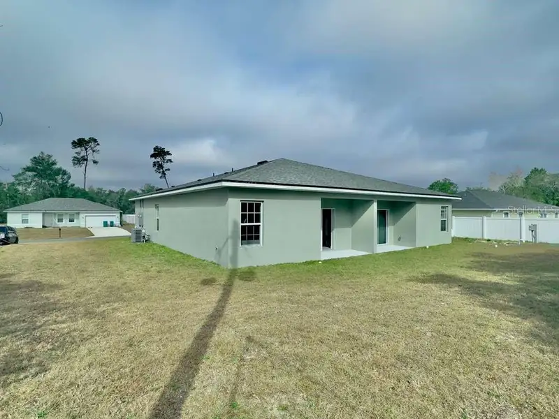 Exterior details and patio area of a home in , Ocala (Image 3).