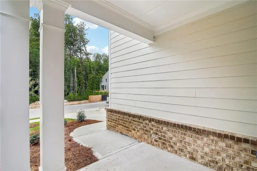 Exterior details and patio area of a home in Crofton Place Enclave, Snellville (Image 22).