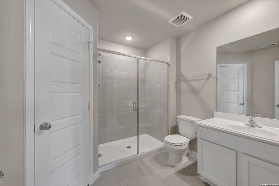 Furnished interior view inside a new home in Greenspoint Heights, Seguin (Image 14).