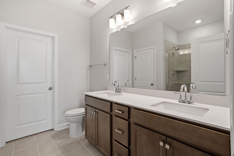 Furnished interior view inside a new home in Ovation at Sweetbrier, Durham (Image 13).