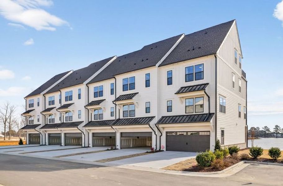 Representative exterior photo of a completed home built from the Hollis TH by True Homes in North District at Flowers Plantation Townhomes, Clayton, NC (Image 2).